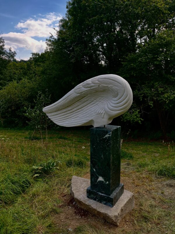 Portuguese marble wing on a Greek marble base on a Block of
