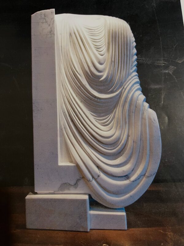 Looking at this old Carrara marble carving of mine as a reference
