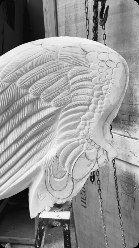 A Alabaster wing carving , returning to this familiar subject has often